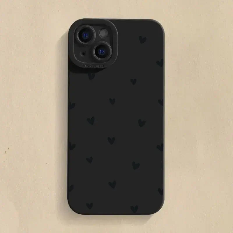 Black Love Heart iPhone Case made of soft silicone with a stylish heart pattern, providing shockproof protection.
