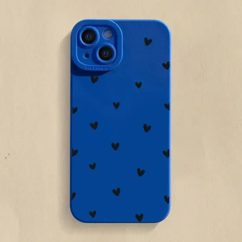 Blue iPhone case with black heart pattern, designed for stylish protection and grip, suitable for various iPhone models.
