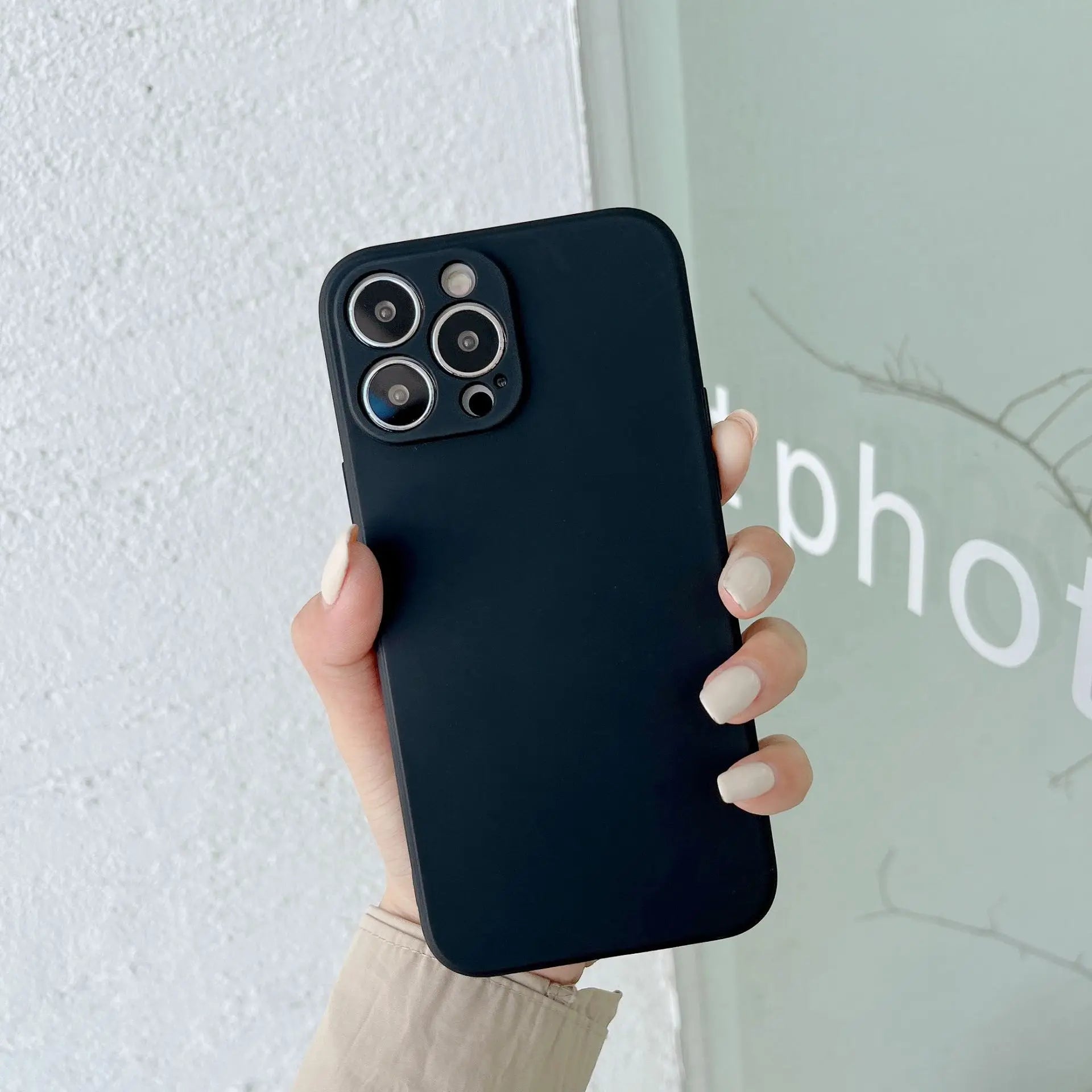 Minimalist Black iPhone case with anti-fingerprint technology and slim design for maximum protection.